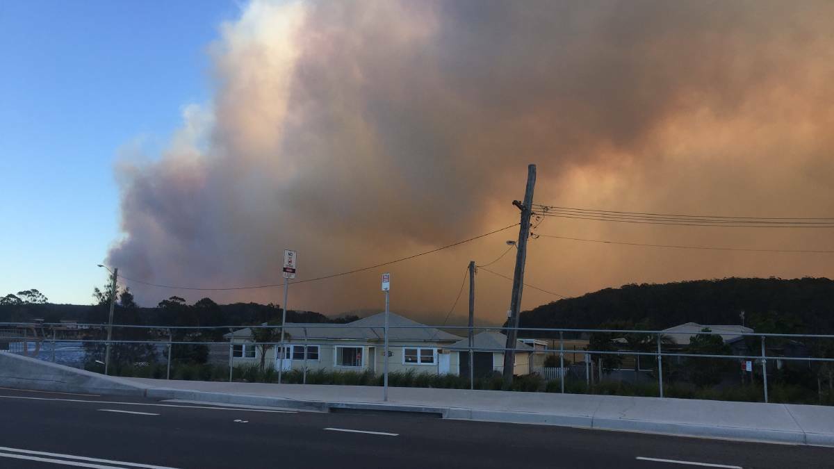 A bushfire burns in Milton near Ulladulla on the NSW South Coast.  Photo: Milton Ulladulla Times