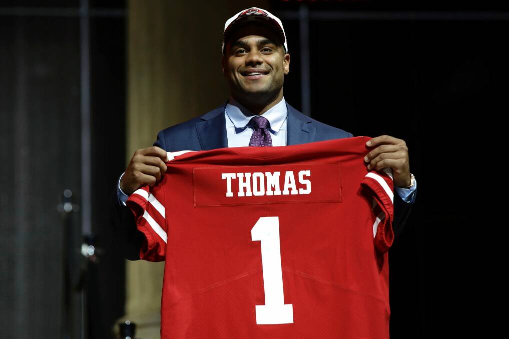 No.1: Stanford University star Solomon Thomas poses after being selected by the San Francisco 49ers. Photo: AP