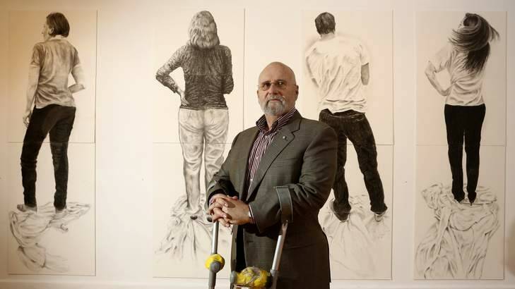 Artist Roger Beale in front of his work 'The Family'. Photo: Jeffrey Chan