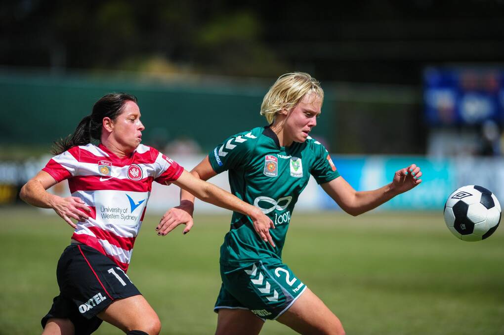 Canberra United defender Catherine Brown, right, will line up for Belconnen United in Sunday's Federation Cup final against Gungahlin United.