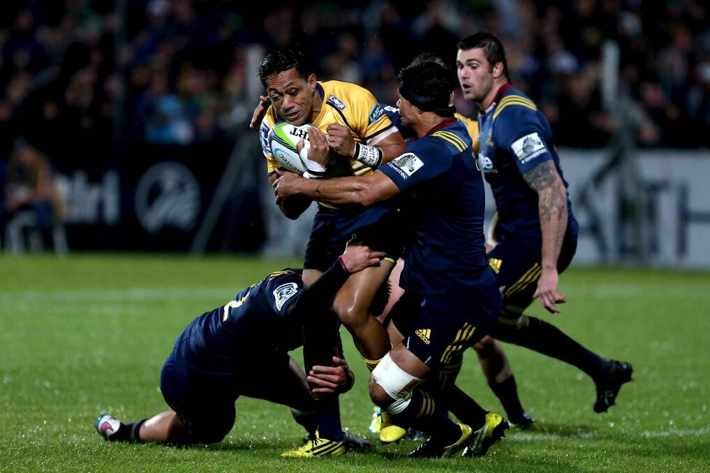 Christian Lealiifano of the Brumbies tries to break through the Highlanders' defence at Rugby Park in Invercargill, New Zealand.  Photo: Getty Images