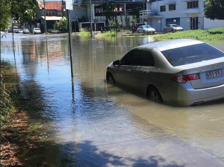 A king tide in Windsor on January 3, 2018 saw streets flooded and cars partially submerged. Photo: 7 News Queensland - Kate Leonard-Jones