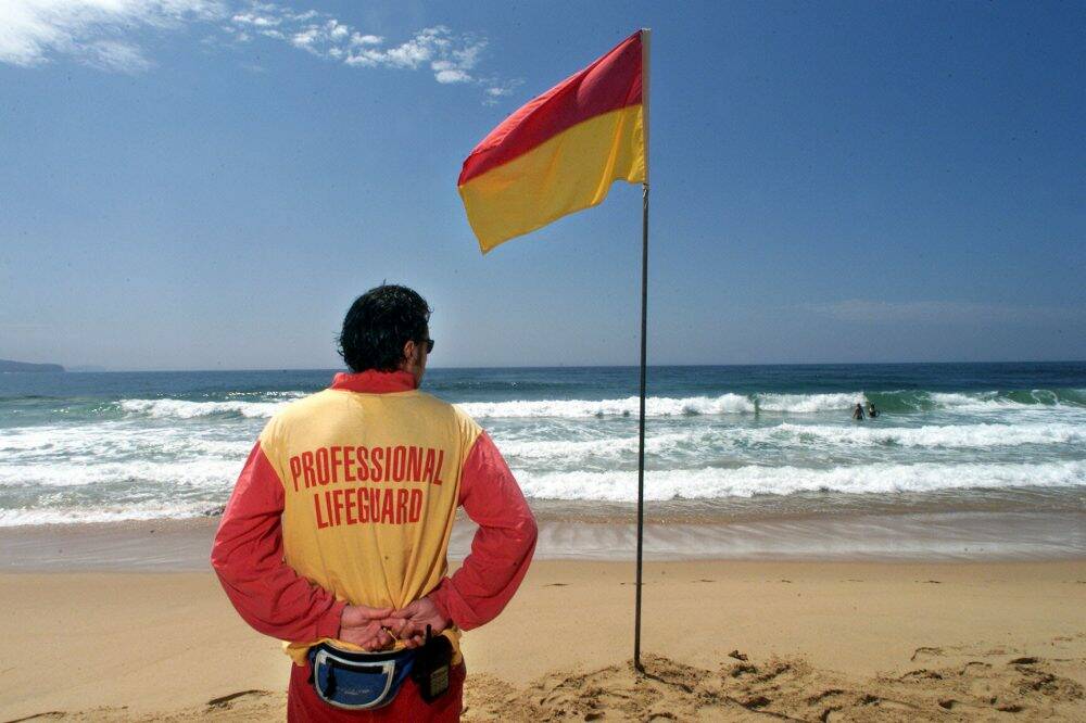 Sunshine Coast lifeguards are advising beachgoers to stay close to the shore and swim between the flags. Photo: Robert Pearce