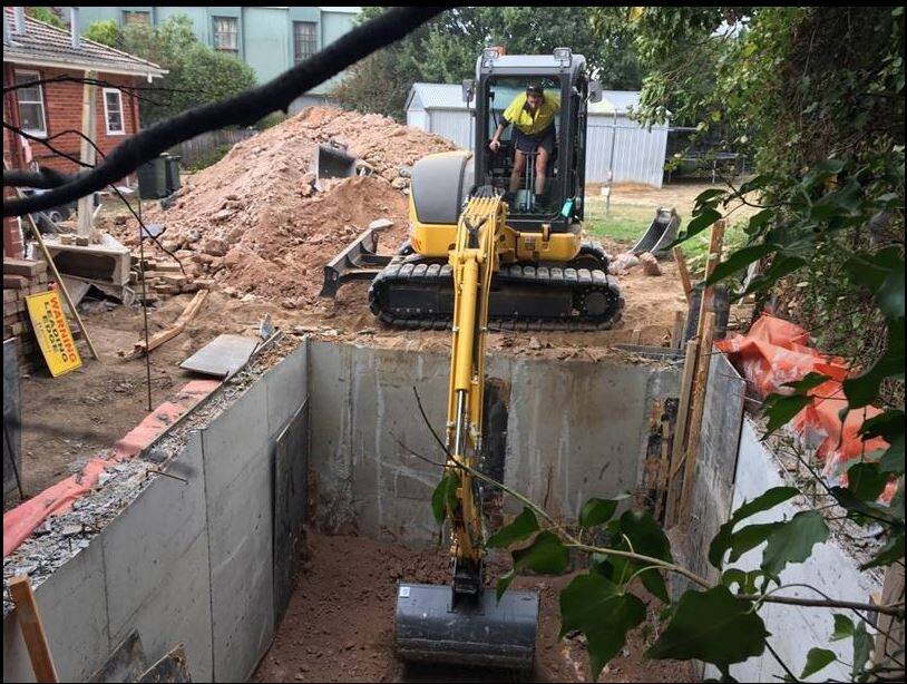 A cellar being dug next to a property in Narrabundah, without consultation with the neighbours. The cellar is within the planning rules and doesn't require consultation.