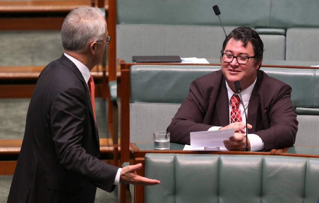 Coalitin MP George Christensen, pictured with Prime Minister Malcolm Turnbull, moved a counter motion against Labor's banks royal commission. Photo: Andrew Meares