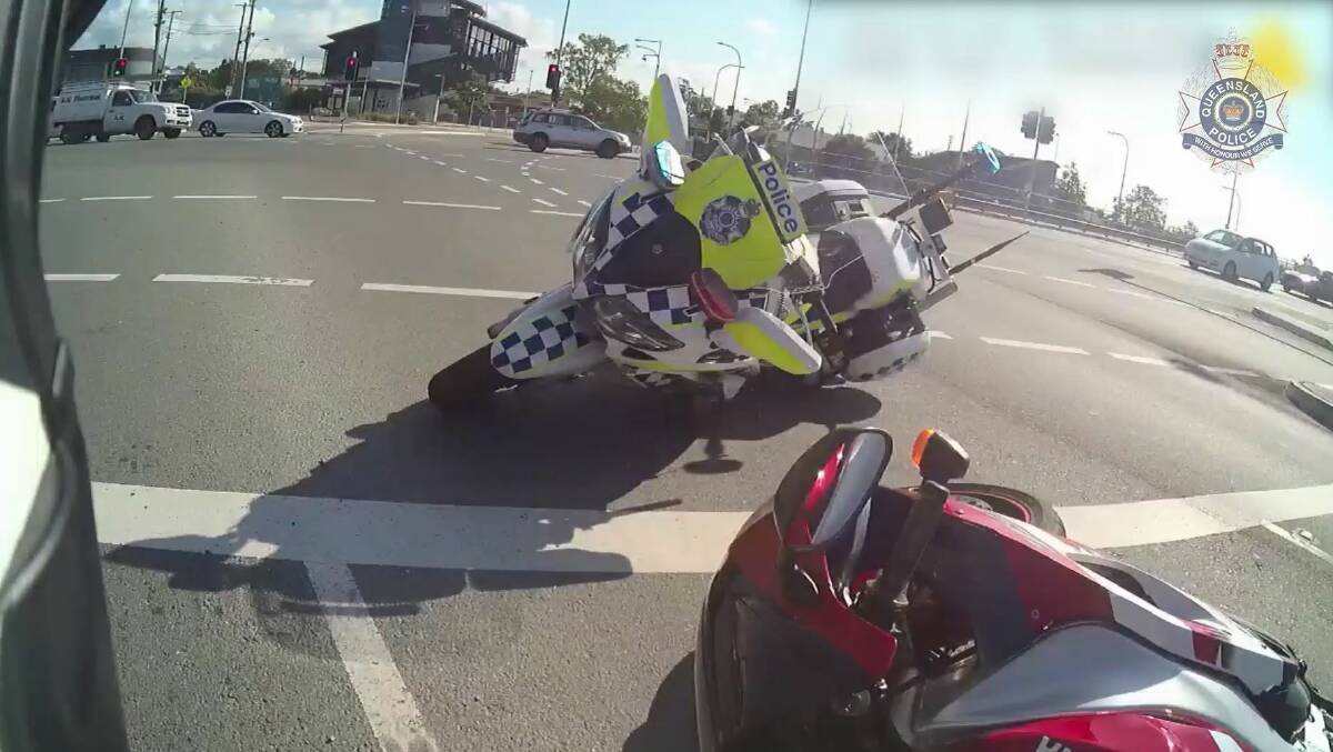 A Queensland police officer has been rammed by a motorbike moments before chasing the rider down and tackling him to the ground in Brisbane's north.  Photo: Queensland Police Service