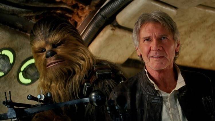 Han Solo (Harrison Ford) and Chewbacca (Peter Mayhew) in Star Wars: The Force Awakens. Director J. J. Abrams' new movie is a comfortable reworking of films that were themselves comfortable reworkings.