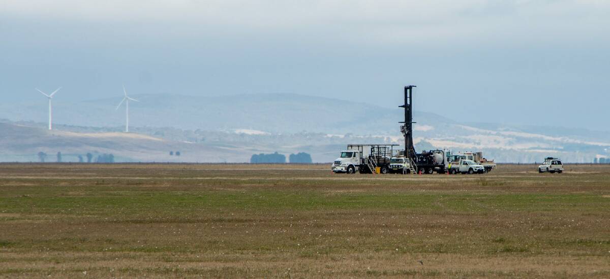 The drilling tower that recently appeared on the dry bed of Lake George. Photo: Chris Blunt