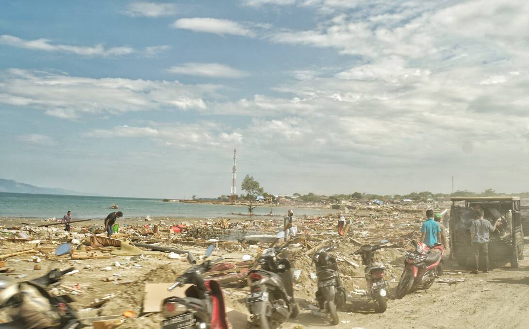 Motorbikes that ran out of fuel are left at the beachfront. Photo: Amilia Rosa
