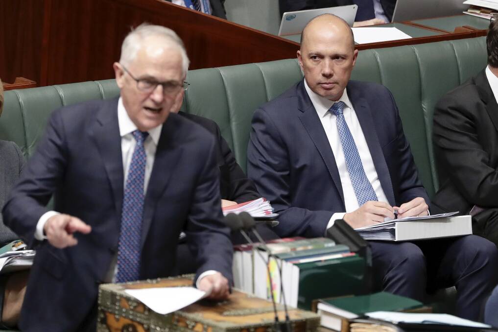 Prime Minister Malcolm Turnbull and Peter Dutton in Question Time on Monday. Photo: Alex Ellinghausen