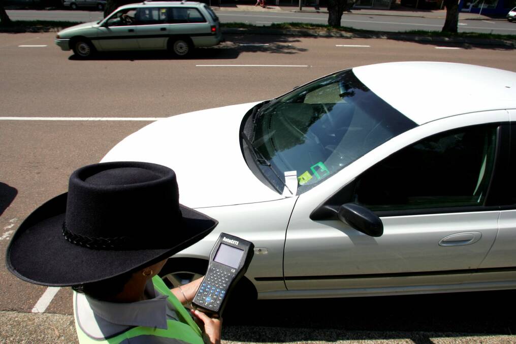 Technology could soon make parking inspectors' jobs easier. Photo: Kitty Hill
