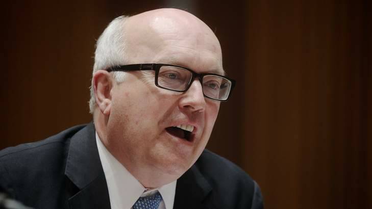 Attorney-General George Brandis said the Australian government remains committed to countering terrorism because the threat is "undiminished'', but federal agencies seem to be cutting back on counter-terrorism activities. Photo: Alex Ellinghausen