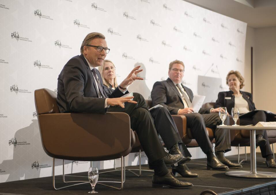 CSIRO chairman David Thodey (left), who is leading a review of the public service, at an Institute of Public Administration Australia forum in April. Photo: IPAA (ACT division)