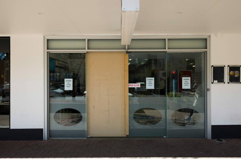 The store has been boarded up since earlier this month. Photo: Rohan Thomson