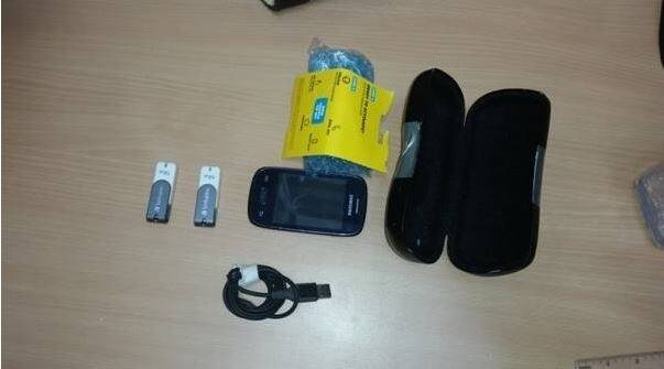 Seized drugs, and electronics allegedly destined for Canberra prison. Photo: Supplied