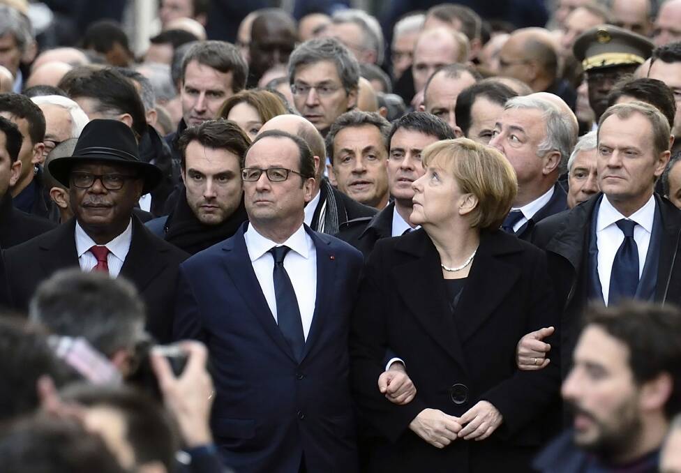 From left: Malian President Ibrahim Boubacar Keita, French President Francois Hollande, France's former President and leader of the right-wing UMP party Nicolas Sarkozy, France's Prime Minister Manuel Valls, German Chancellor Angela Merkel, and European Union President Donald Tusk.  Photo: AFP