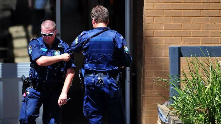 NSW Police at the scene of the alleged stabbing. Photo: Karleen Minney