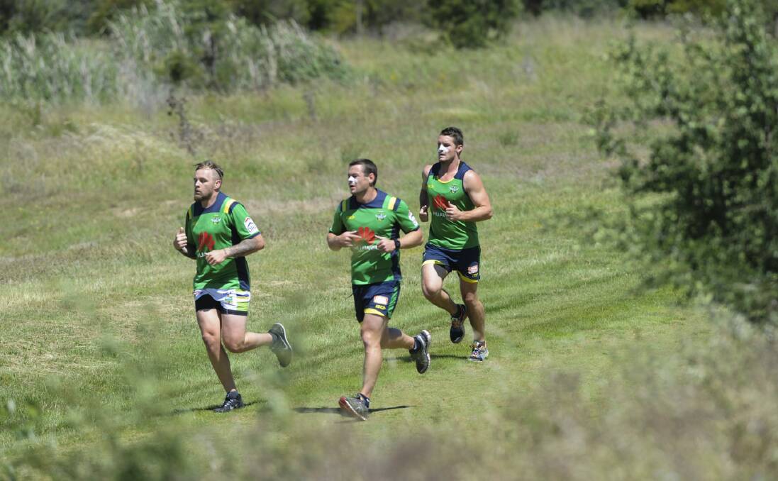 Blake Austin, Shaun Fensom and Jarrod Croker go through their paces.
 Photo: Graham Tidy