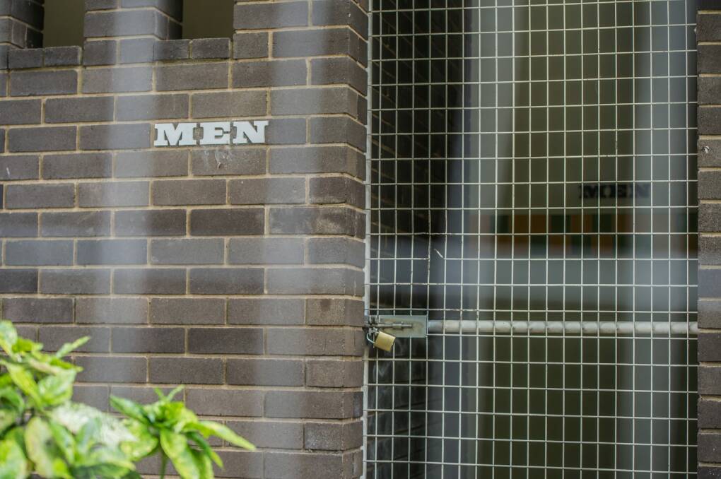 Access to toilets at the Lobby complex adjacent to the Aboriginal tent embassy has been cut off via fencing and padlocks.  Photo: karleen minney