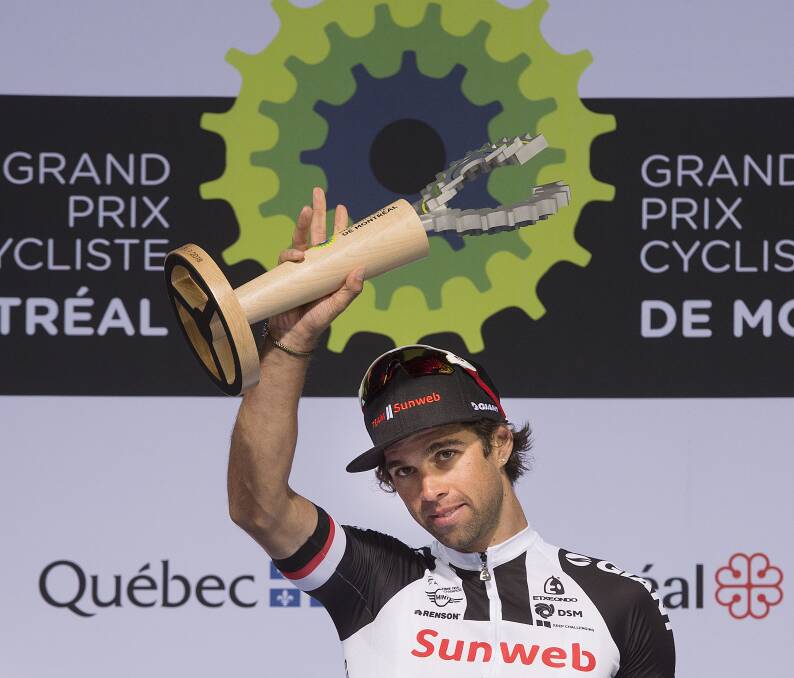 Michael Matthews celebrates on the podium. Photo: Peter McCabe/The Canadian Press