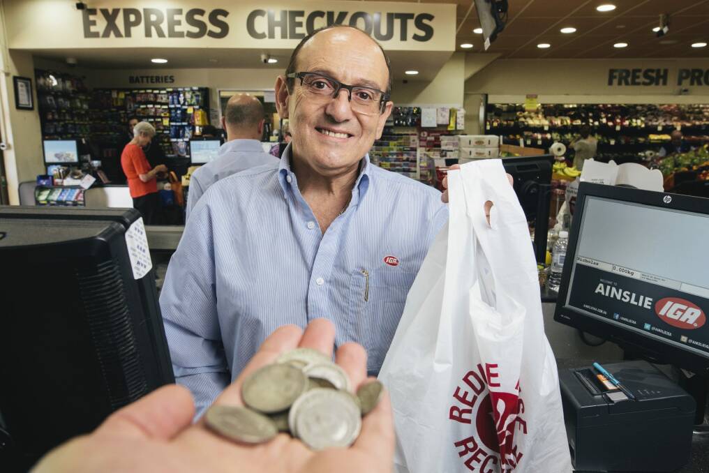 Ainslie IGA owner  Manuel Xyrakis was just 11 years old and working in the supermarket after school when decimal currency was introduced on February 14, 1966. Photo: Rohan Thomson