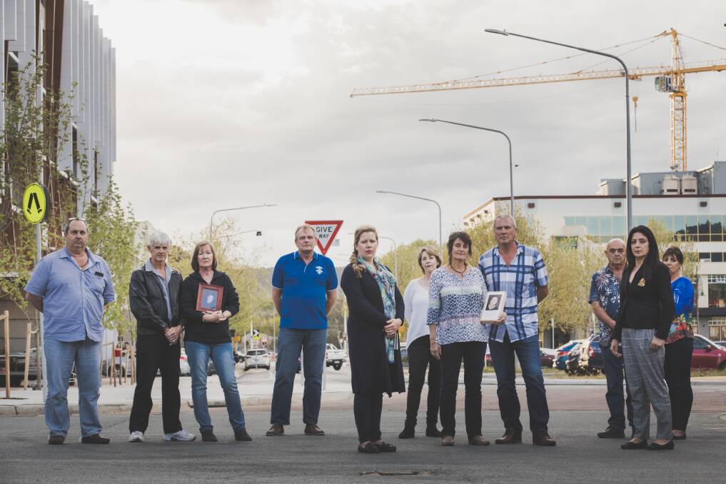 Families of those killed in industrial accidents gathered in Canberra in October ahead of the tabling of the report. Many are now unhappy with the government response. From left: Greg Zappelli, Mark and Janice Murrie, Michael Garrels,  (center) Dr. Lana Cormie, Shauna Branford, Robyn and Tony Hampton, Dave and Janine Brownlee, and Linda Moussa. Photo: Jamila Toderas