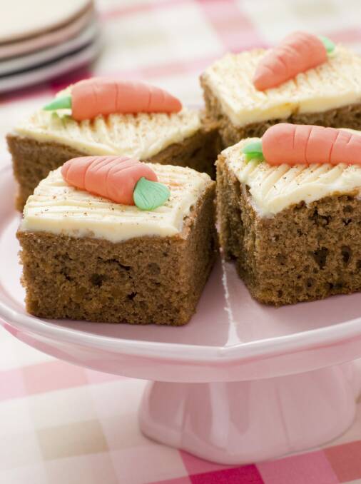 Carrot cake with lemon icing. Photo: Monkey Business Images