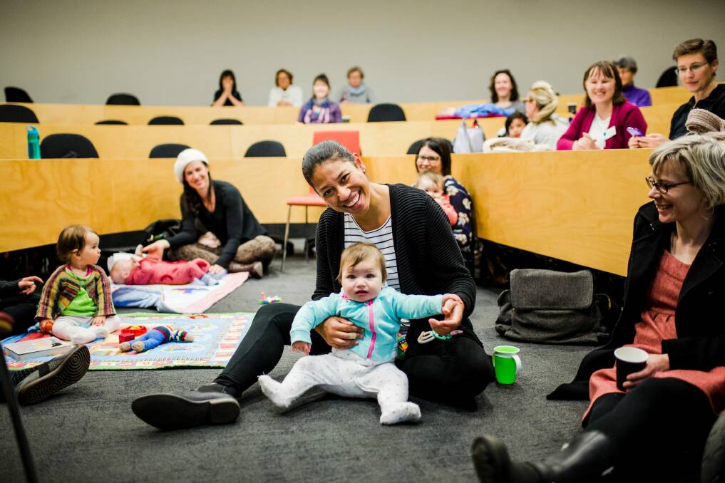 ANU staff attended a seminar on Friday with their bubs to address cultural and structural support for breastfeeding on campus. Associate Professor Katerina Teaiwa of ANU, with her daughter Kiera Teaiwa Mortimer 8-months-old. Photo: Jamila Toderas