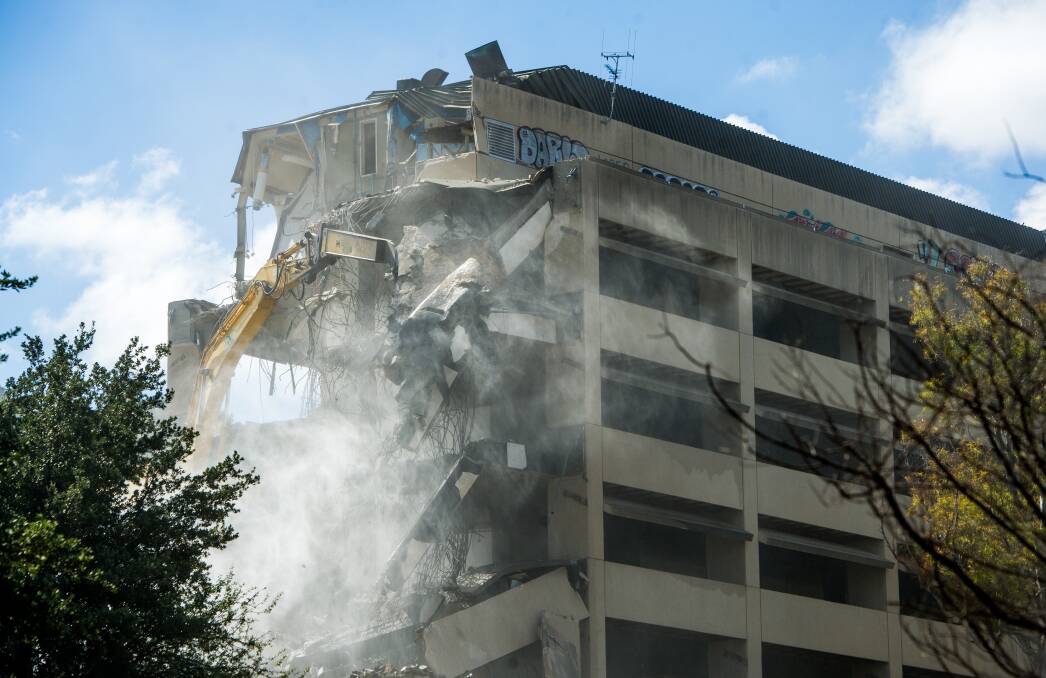 Demolition of the former CSIRO headquarters in Campbell is underway to make way for two apartment blocks and over 100 townhouses. Photo: Photo Elesa Kurtz
