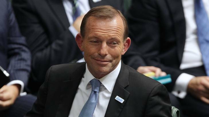 First stooge of the silly season ... Opposition Leader Tony Abbott, who suggests paying senior public servants bonuses if they cut "red tape". Photo: Alex Ellinghausen