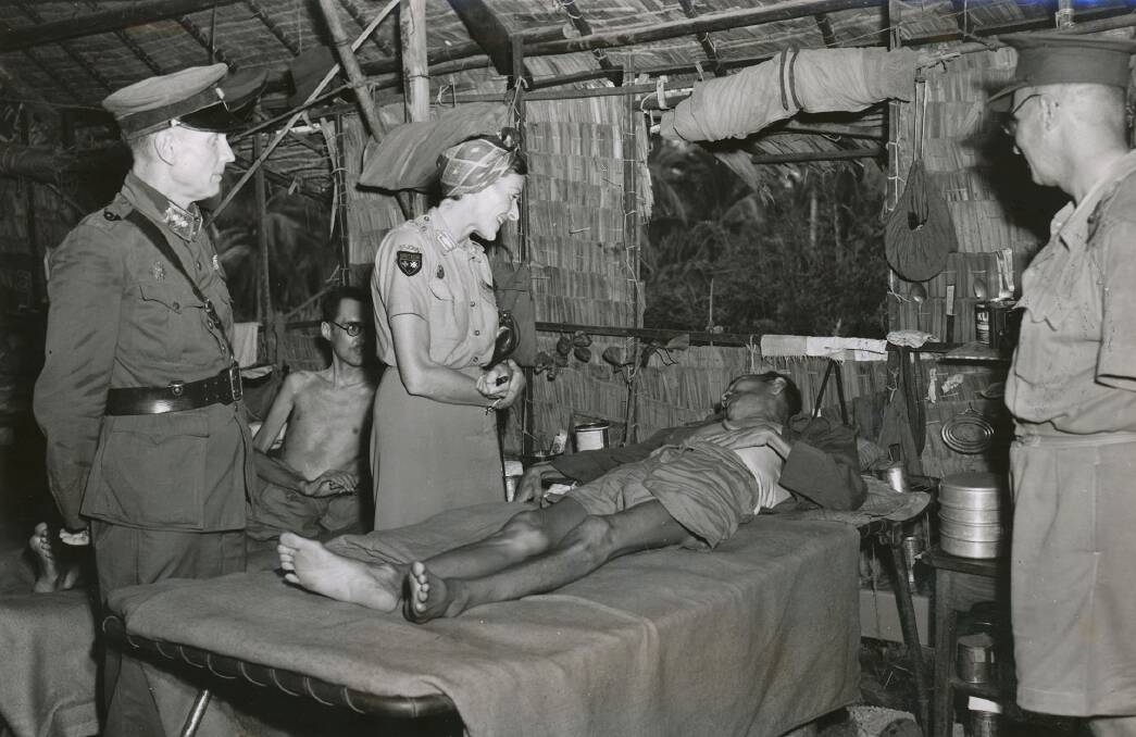 Lady Mountbatten visits Allied prisoners of war in Changi in September 1945. The men were sensitive about their lack of clothes.