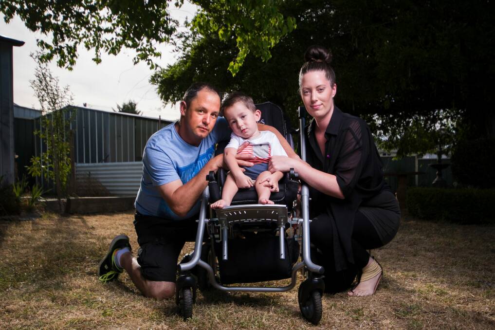 Ben McLennan and Naomi Taylor with their son William McLennan, 2, who has Spinal Muscular Atrophy.  Photo: Dion Georgopoulos