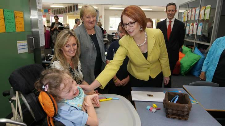 Prime Minister Julia Gillard visits Kingsford Smith Primary School in Canberra. She says she has the political will to see the Gonski school funding reforms through. Photo: Alex Ellinghausen