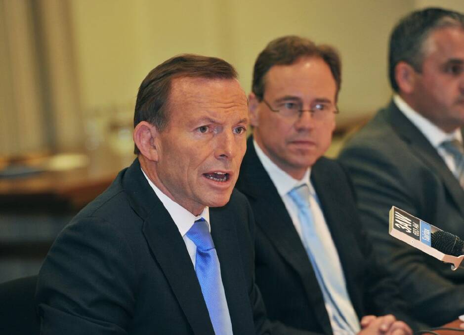 Prime Minister Tony Abbott and Environment Minister Greg Hunt. Photo: Joe Armao