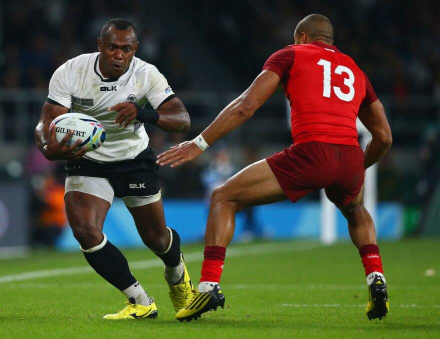 Fijian flyer: Waisea Nayacalevu of Fiji on the attack against England. Photo: Getty Images