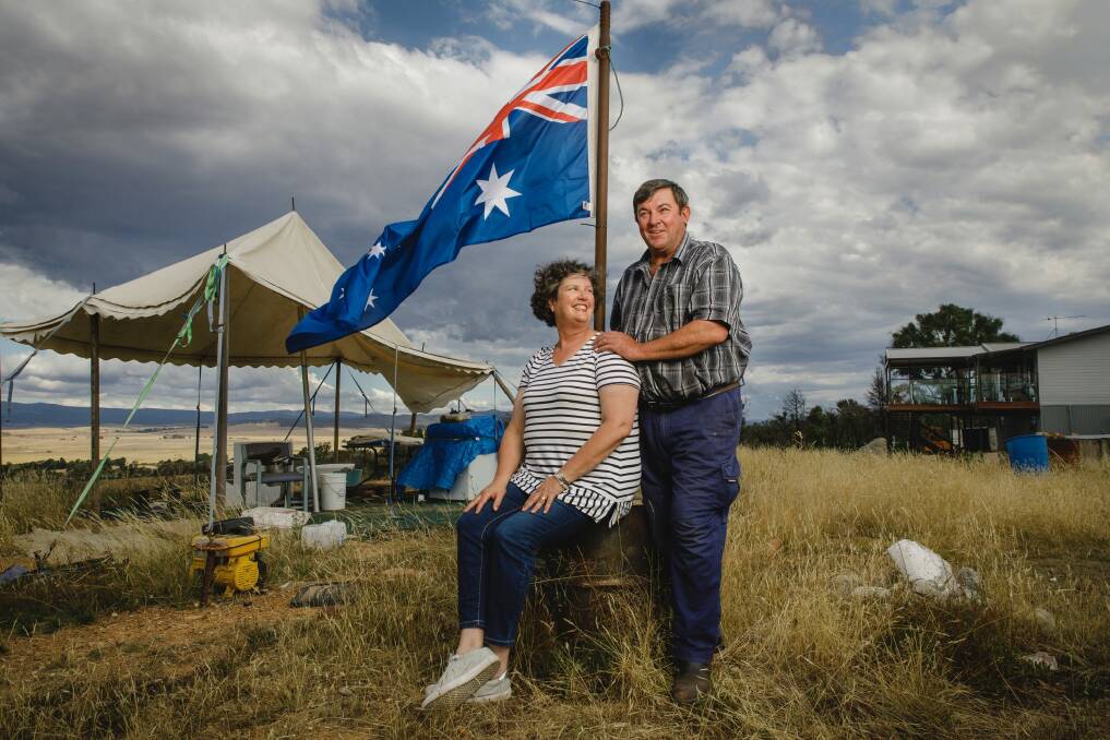 Vanessa and Kevin Lindley, one year on from the fires that tore through Carwoola. Photo: Sitthixay Ditthavong