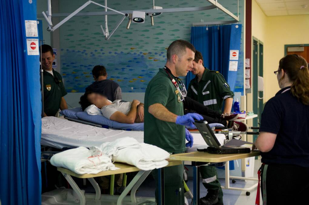 Canberra's stretched emergency departments treated almost 130,000 patients during 2014-15. Photo: Jay Cronan