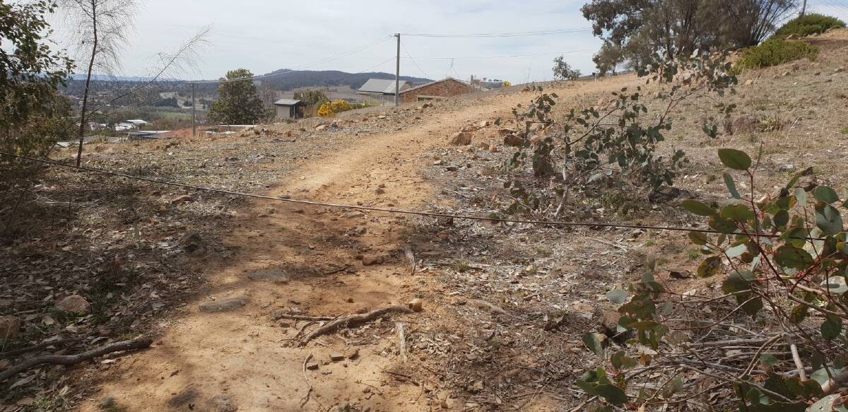 Wire seen strung across a trail at Tuggeranong Hill Nature Reserve targeting cyclists. Photo: Supplied