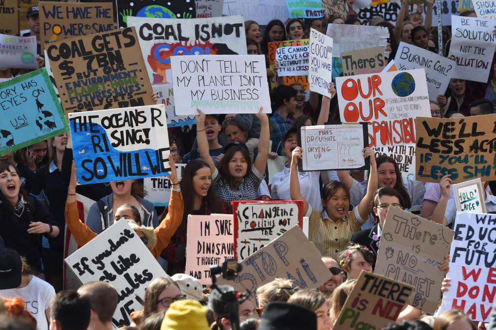 Students flocked to the streets of Melbourne to protest climate change inaction Photo: Justin McManus