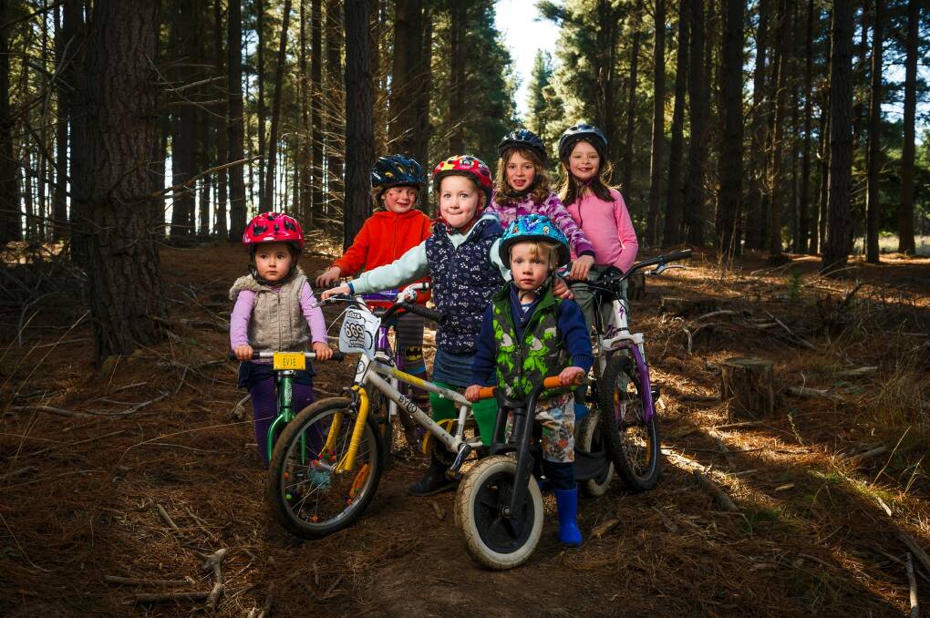 Children of the volunteer-run Majura Pines Trail Alliance ride their bikes at the recreation area. Evelyn Hill, 3, Curtis Gant-Davison, 4, Isla Hannah, 4, Gemma Gant-Davison, 8, Theo Hannah, 2, and Isabel Young, 8. Photo: Dion Georgopoulos