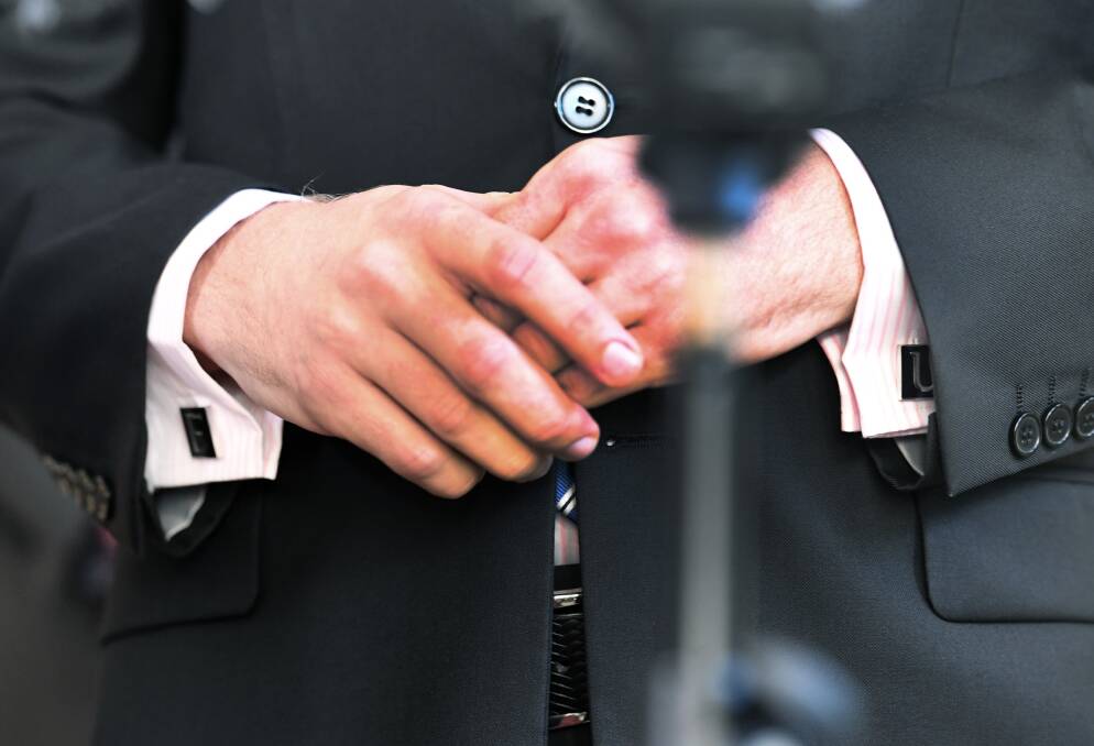 LNP MP Jarrod Bleijie's "F" and "U" cufflinks caused a stir during estimates hearings. Photo: AAP Image/ Dan Peled