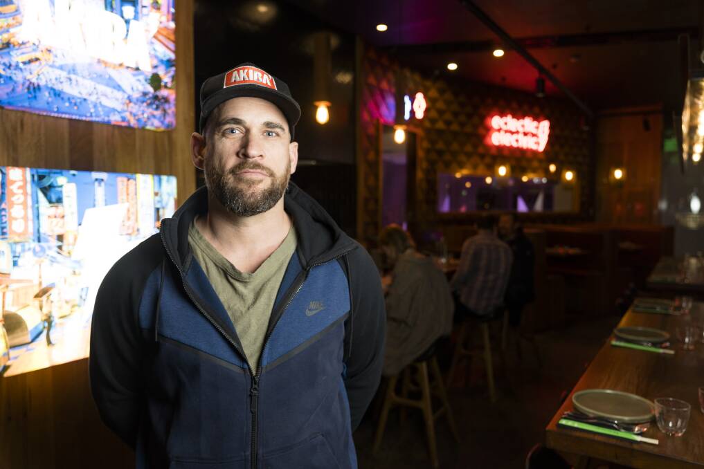 Akiba owner Pete Harrington has three venues in Canberra, and is part of a hospitality industry that is currently booming. Photo: Lawrence Atkin