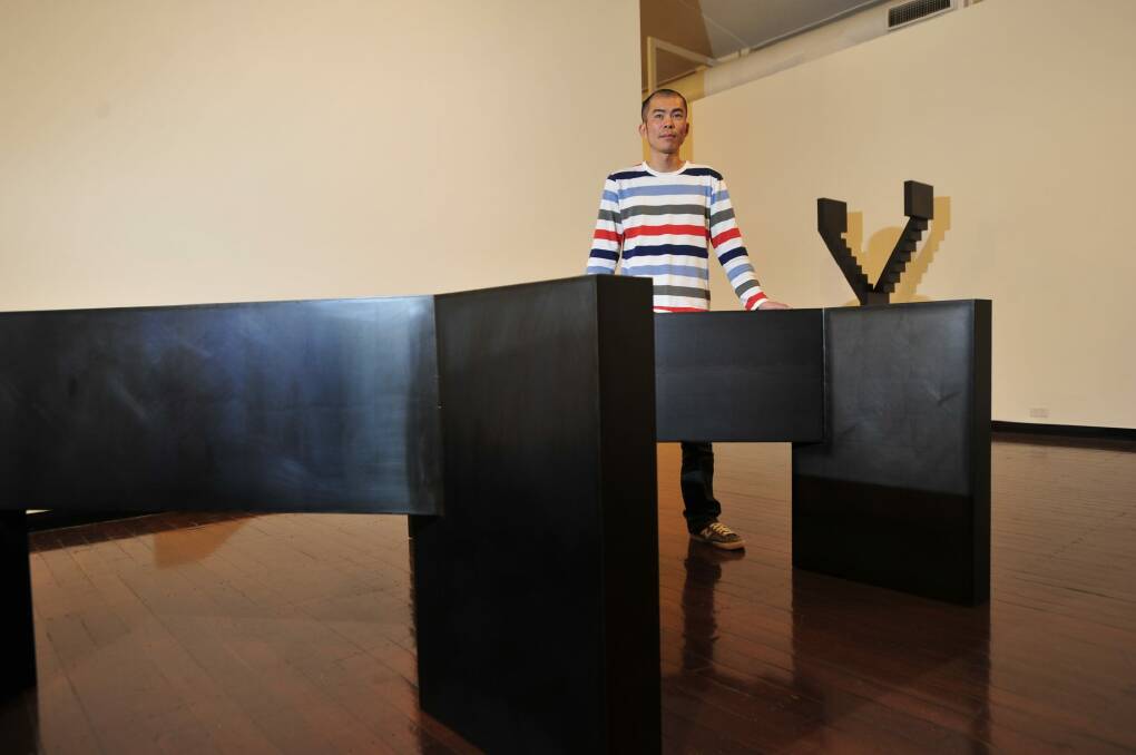 Prized: Japanese-born Canberran Kensuke Todo has won top honours for his steel sculptures. Photo: Melissa Adams