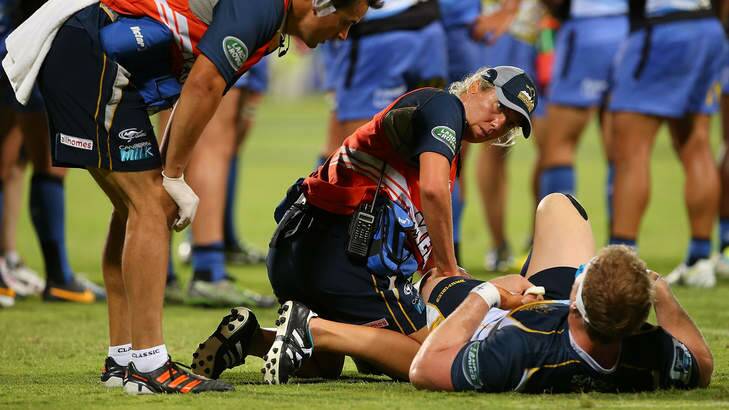 David Pocock receives treatment on his knee against the Force. Photo: Getty Images
