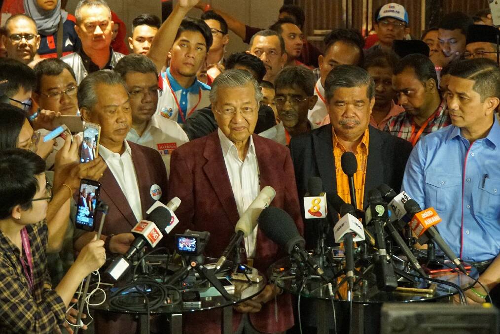 At a late-night conference, Mahathir told reporters it looked like Malaysia would have its first change in government in 61 years. Photo: Amilia Rosa