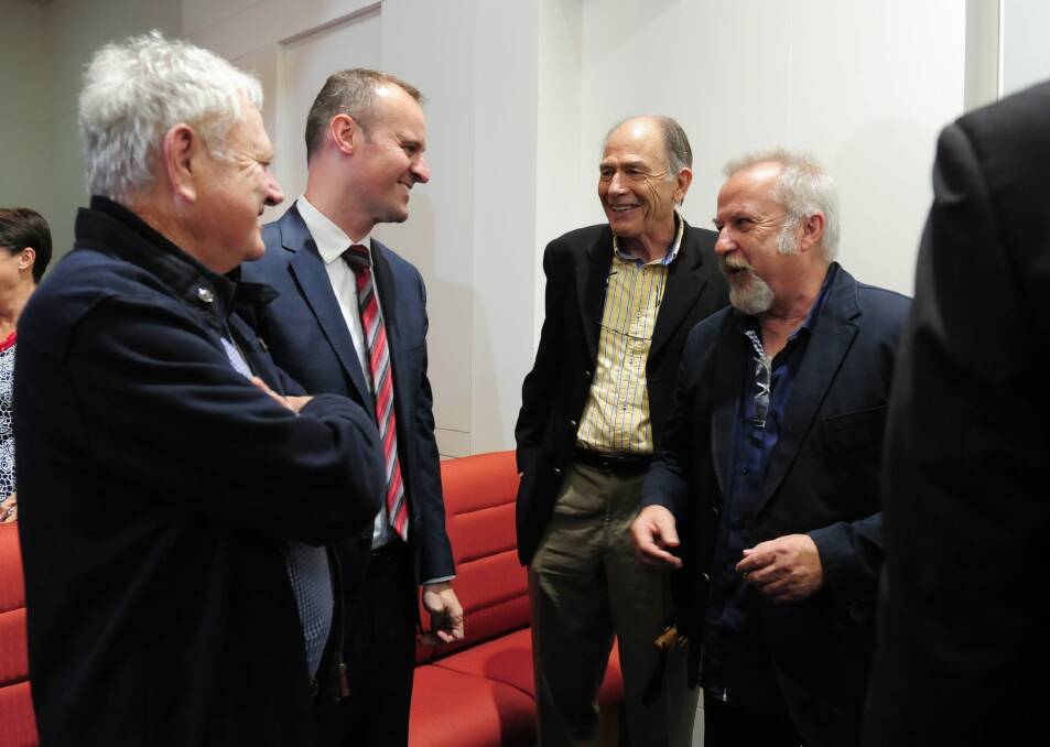 Chief Minister Andrew Barr, second from left, with former Labor figures Wayne Berry, second from right, and David Lamont, right.  Photo: Graham Tidy 