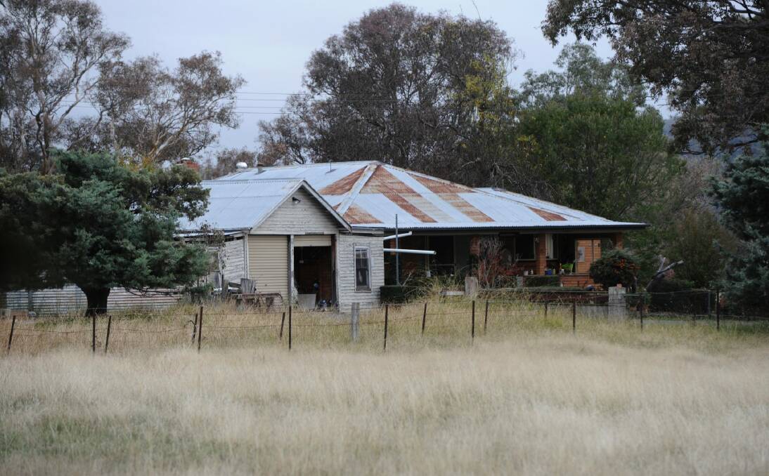 This home, on land now owned by the ACT government, would be demolished if the Williamsdale solar farm was built on the site planned.  Photo: Graham Tidy