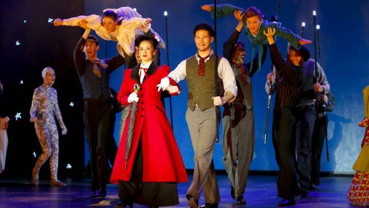 "Mary Poppins" - centre, Alinta Chidzey (in red) as Mary Poppins and Shaun Rennie (next to her) as Bert. Credit: Family Fotographics. Photo: Steph Burgess