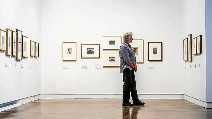 The NGA's Roger Butler checking out the Jessie Traill exhibition. Photo: Rohan Thomson