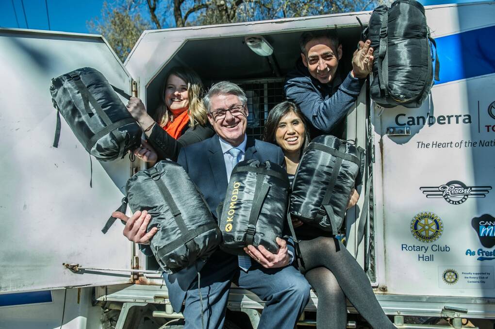 Spare 10 is supporting Canberra's homeless along with Vinnies. Working together are (back left) Emma Madsen co-founder Spare 10, Tim Coxhead, co-ordinator Vinnies night patrol, (front left) Barnie Van Wyk, CEO St Vincent de Paul and Soudalay Thannawongsa co-founder Spare 10. Photo: karleen minney